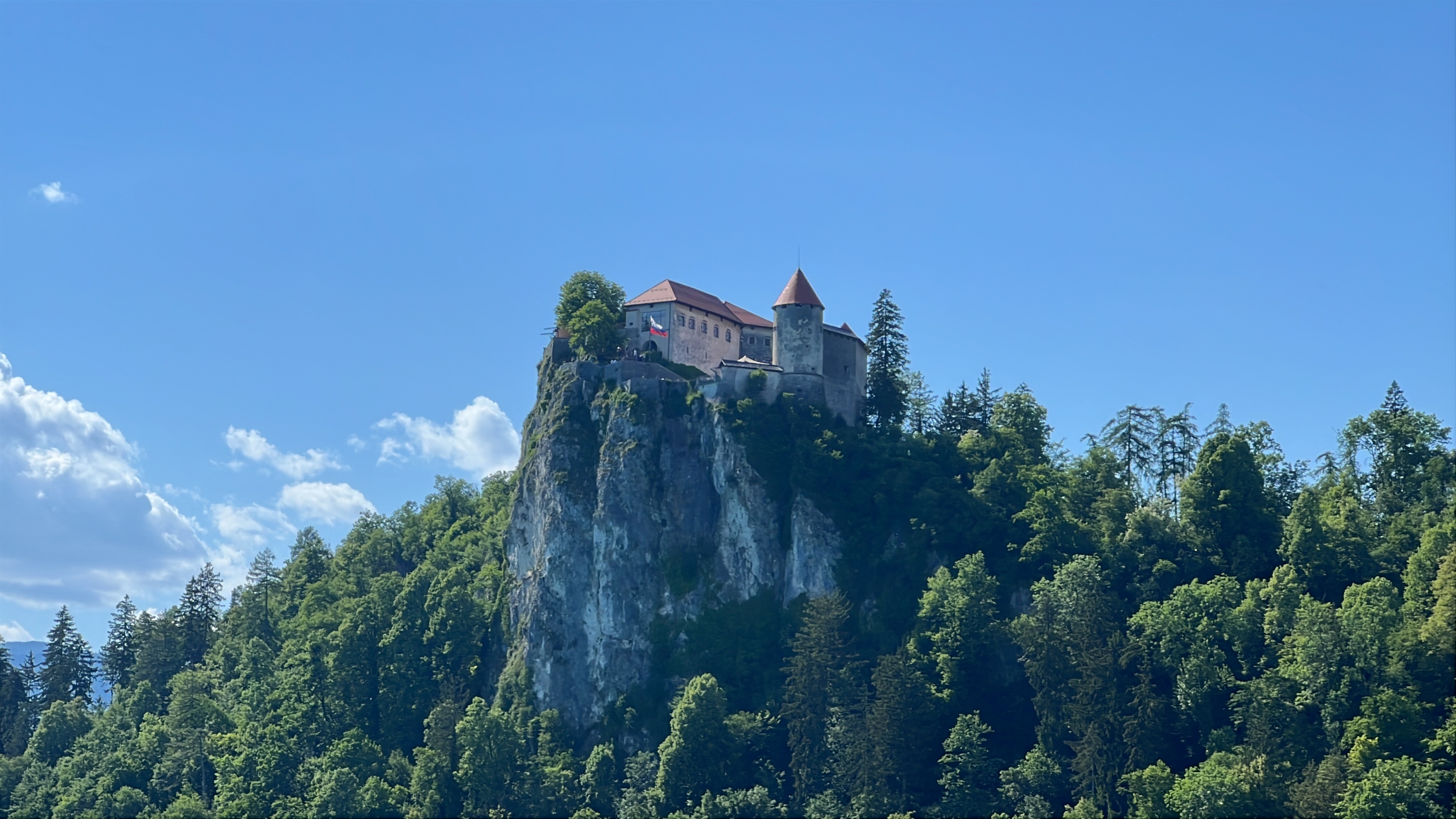 Bled Castle on its cliff above the lake, on Iv&aacute;n Verzoub's Slovenia inspection for incentive groups